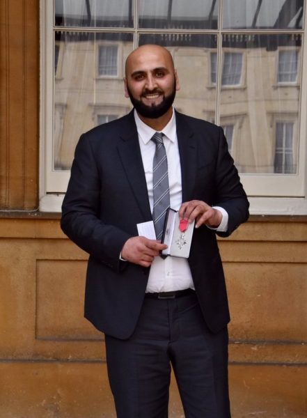 Ash Showing Off His MBE